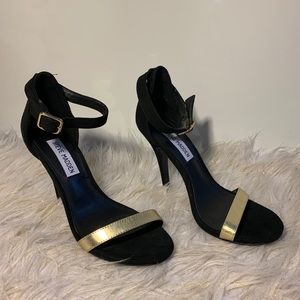 Black/ gold Steve Madden Siletto heels.